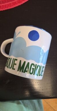 Anthropologie White Mug with Blue Graphic and Green Logo
